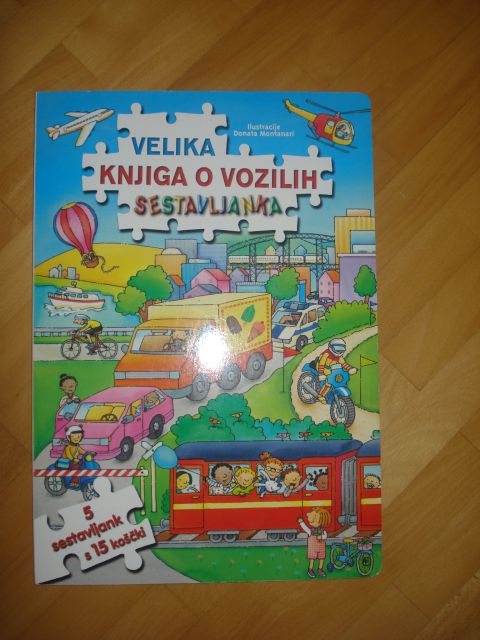 Kartonka Velika knjiga o vozilih z sestavljankami, kot nova cena 6 eur