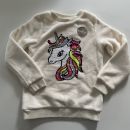 Nov HM kosmaten pulover z aplikacijo