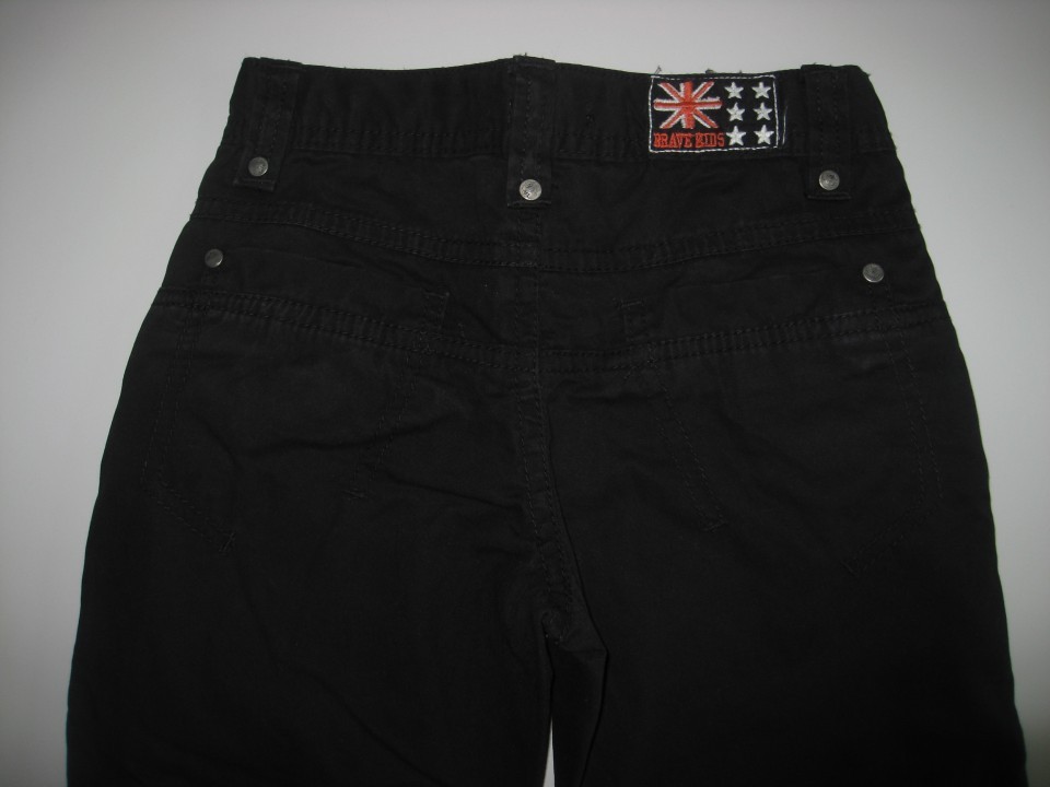 Nove črne podložene hlače Tapealoeil št.  98 do 104 še zadaj