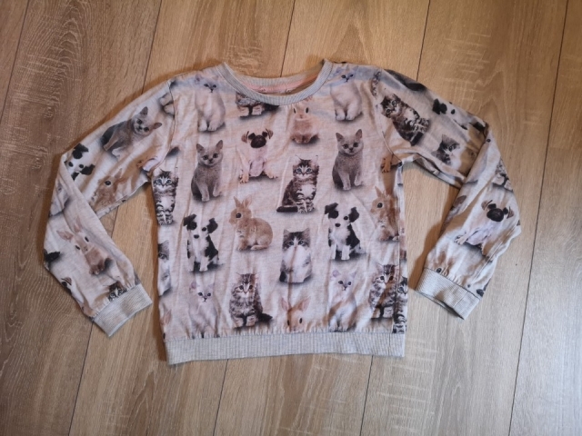 Pulover 122-128, 3€