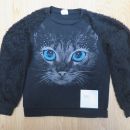 črn pulovar št. 152, cena 3€