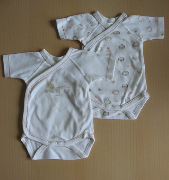 2 bodija C&A, 56, rabljena 1x ali 2x - oba skupaj za 2 € 