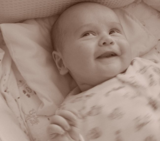 Baby is happy after every breakfast.