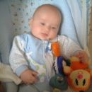 Paul Felipe enjoys discovering his toys...