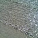 plaža v bibionah v italiji blizu benetk...:)
sem malo slikala morje, valove, raka v vodi,